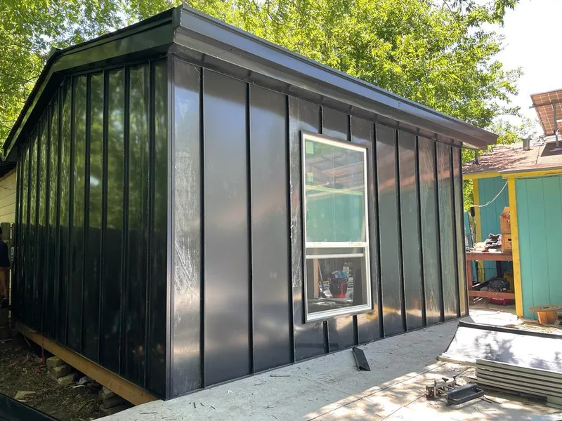 Black standing seam metal wall panels for Roof Inspection in Georgetown